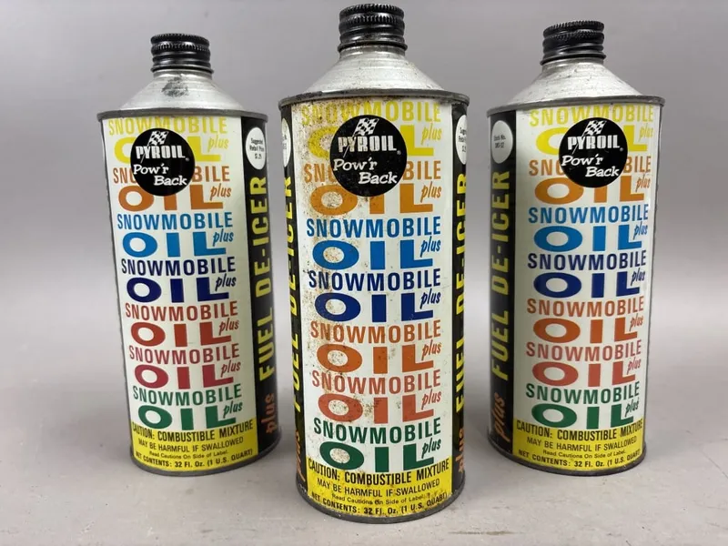 Lot 3 Pyroil Snowmobile Oil Plus 32oz Cone Top Can from auction in Jackson, Michigan