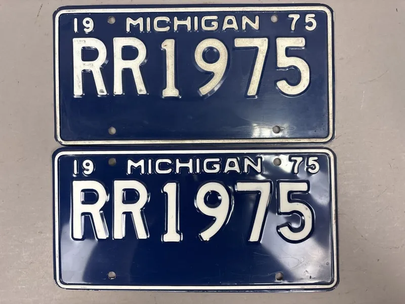 Pair 1975 Rolls Royce Michigan Personalized Plate from auction in Jackson, Michigan