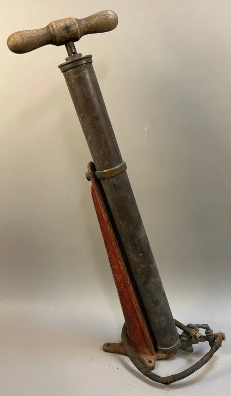 Antique Brass Original Air Pump w/ Original Red Pa from auction in Jackson, Michigan