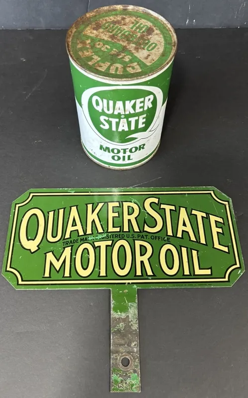 Quaker State Motor Oil Lubester Paddle Sign w/ Quart Can from auction in Jackson, Michigan