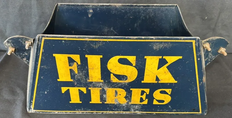 Fisk Tires Painted Metal 1920s Advertising Tire Display Rack from auction in Jackson, Michigan