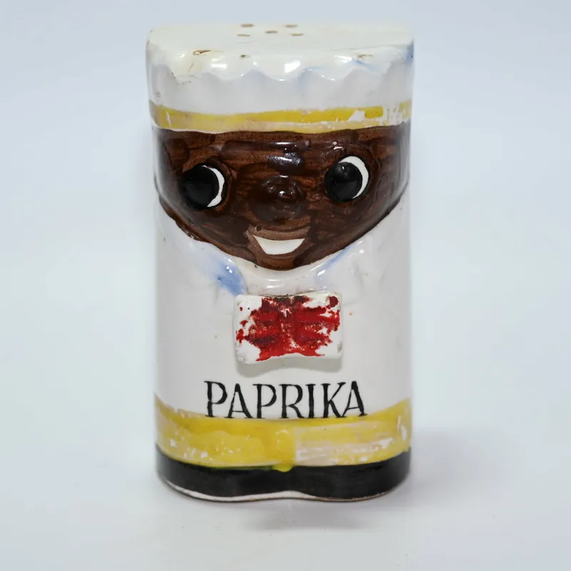 Paprika Book Form Shaker - Black Americana from auction in Winnetka, Illinois