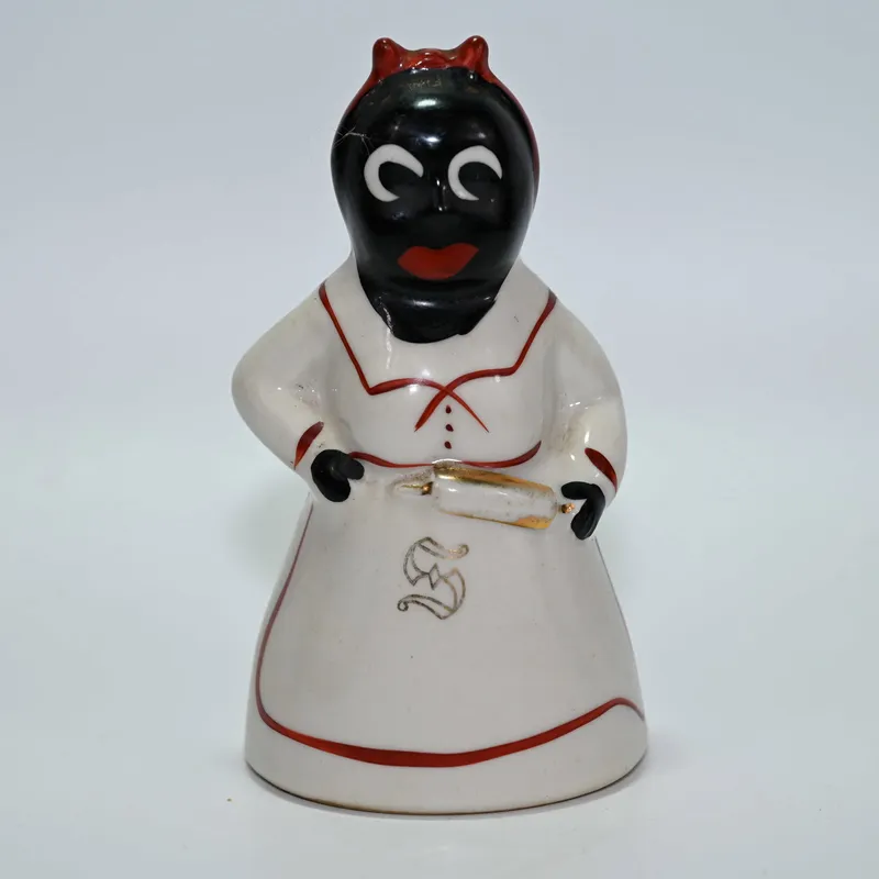 Salt Shaker - Woman with S on Apron - Black Americana from auction in Winnetka, Illinois