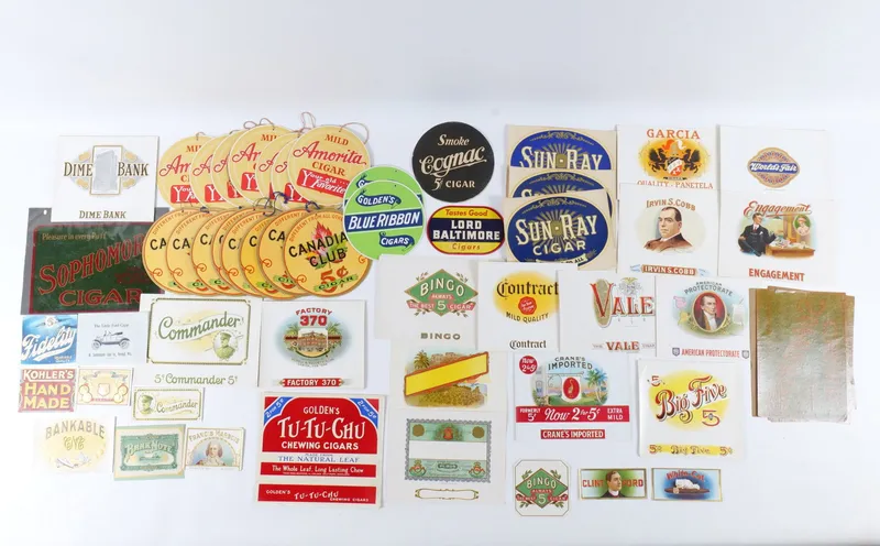 Lot of 75+ Vintage Cigar Advertising Signs., Window Stickers, and Labels from auction in Williamstown, New Jersey
