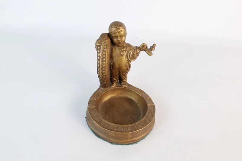 Vintage Fisk Tires Advertising Cast Metal Ashtray from auction in Williamstown, New Jersey