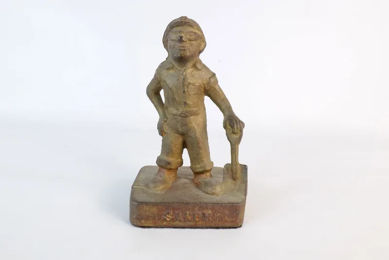 Vintage Cast Iron "Sandy" Coal Miner Figurine/Doorstop from auction in Williamstown, New Jersey