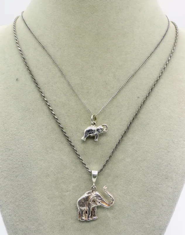 Two Sterling Silver Elephant Pendants from auction in Ottawa, Ohio