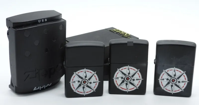 3 Zippo Compass Rose Lighters, Black Matte from auction in Ottawa, Ohio