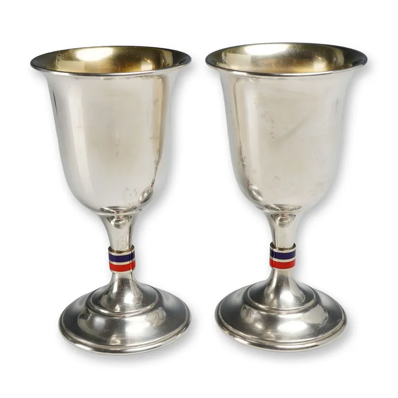 2pc Gucci Sterling Silver and Enamel Web Stripe Goblets from auction in Hollywood, Florida