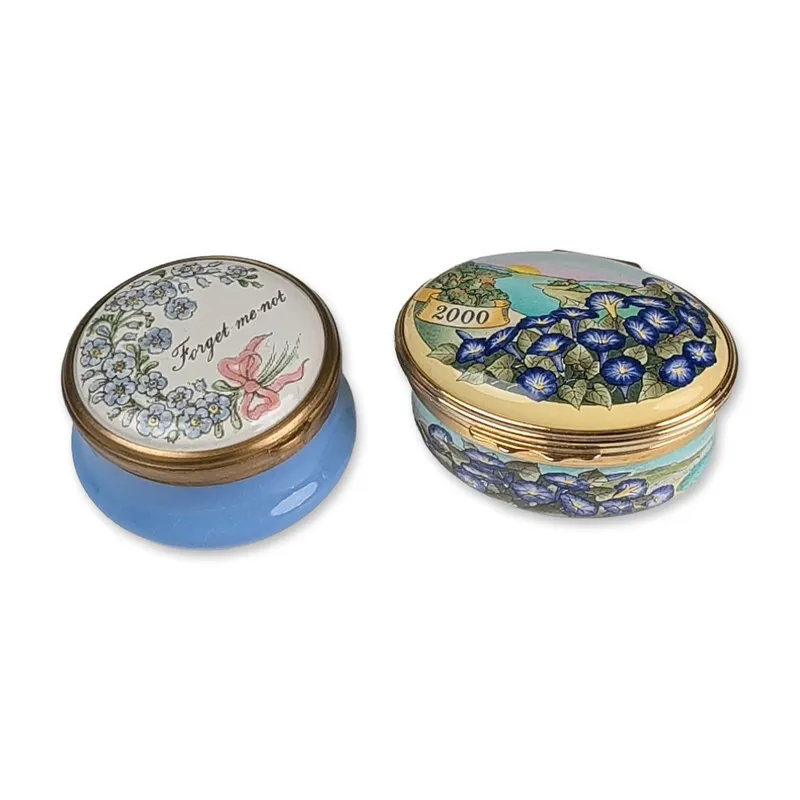 2pc Halcyon Days English Enamel Trinket Boxes from auction in Hollywood, Florida