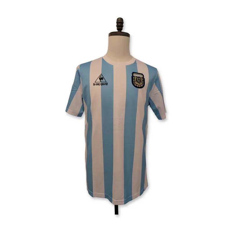 Diego Maradona Signed Argentina Le Coq Sportif 1986 Retro Soccer Jersey from auction in Hollywood, Florida