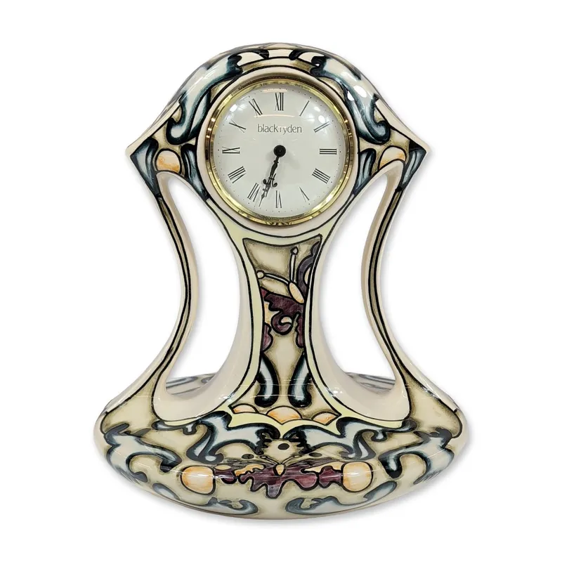 Black Ryden Time Flight Mantel Clock from auction in Hollywood, Florida