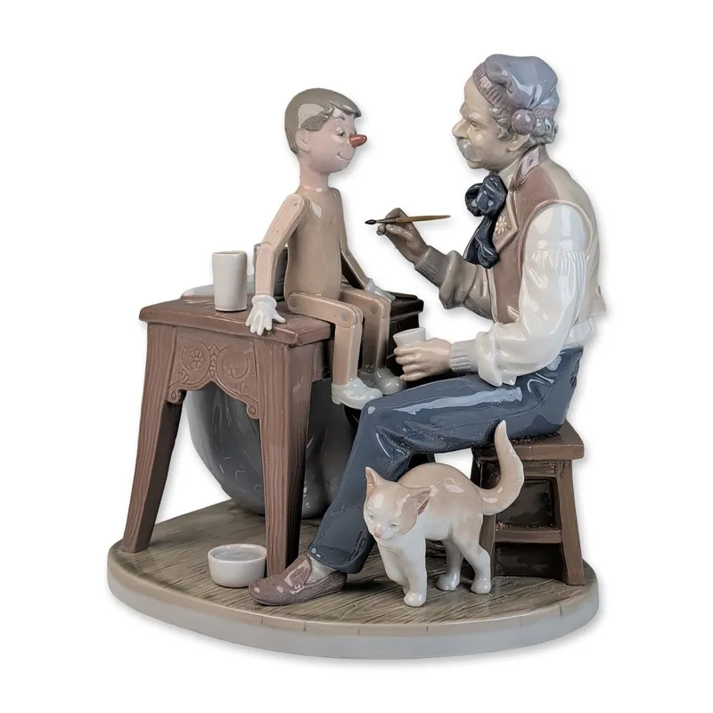 Lladro Glazed Porcelain Figurine, The Puppet Painter 01005396 from auction in Hollywood, Florida