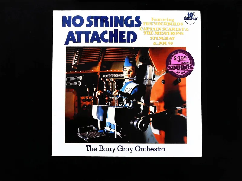 The Barry Gray Orchestra No Strings Attached 10 Inch Long Play Vinyl DOW 3 from auction in Hollywood, Florida
