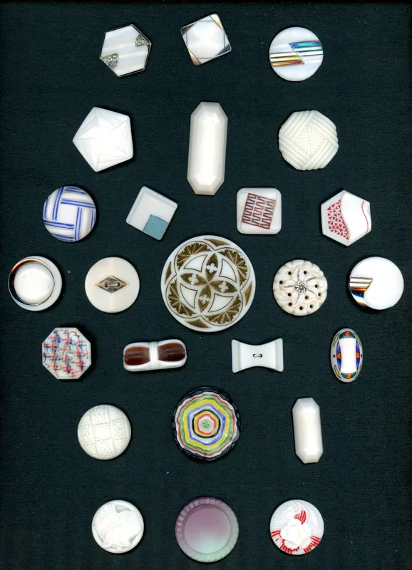 A CARD OF DIVISION THREE ASSORTED GLASS BUTTONS from auction in Hollywood, Florida