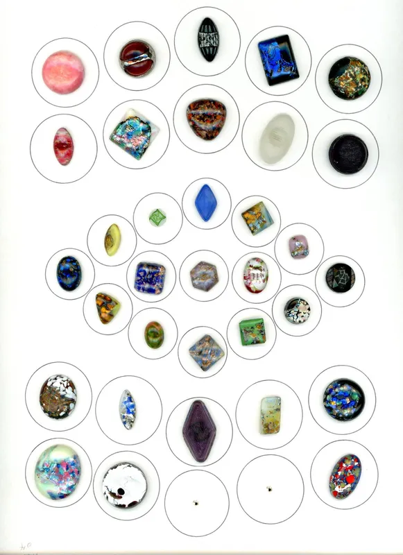 A CARD OF DIVISION ONE COLORFUL GLASS BUTTONS from auction in Hollywood, Florida