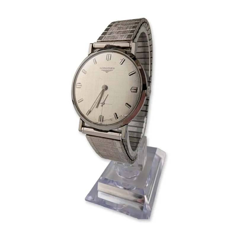 Longines Stainless Steel Linen Dial Dress Watch from auction in Hollywood, Florida