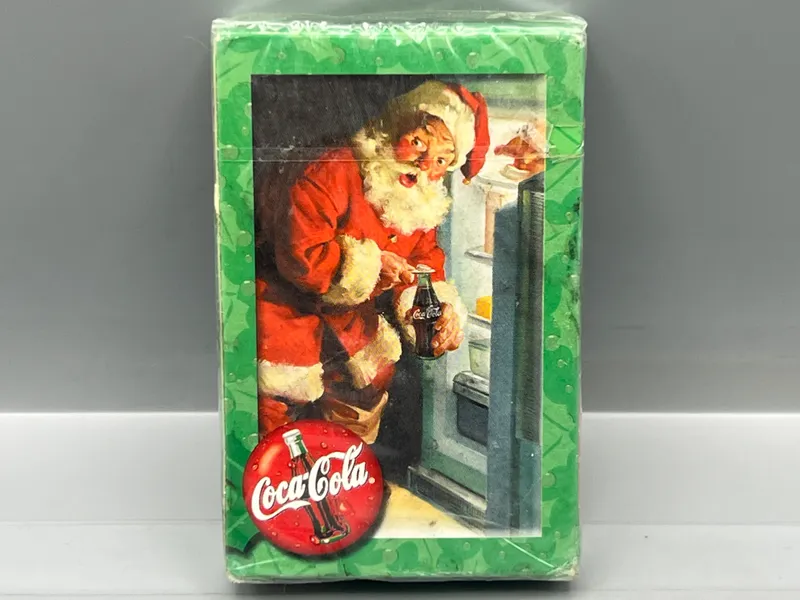 Vintage 1990s Coca Cola Santa Claus Christmas Sealed Playing Card Deck from auction in Greenville, Ohio