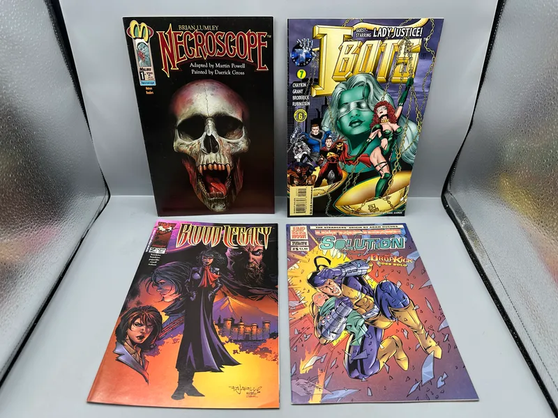Malibu Comics, Tekno Comix, and Image Comics lot of 4 comics including Necroscope #1, I-Bots #7, Blood Legacy #2, and The Solution #5 (1992-2000) from auction in Greenville, Ohio