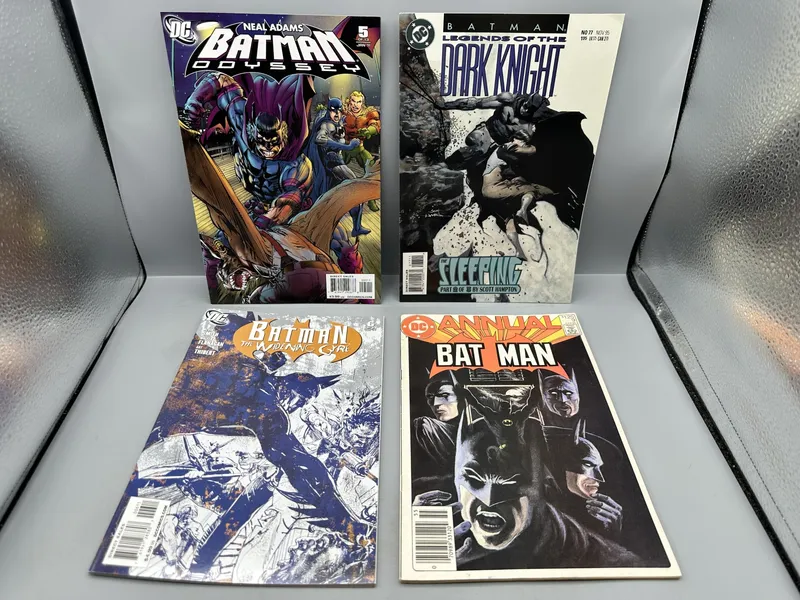 (4) DC Comics Batman Comic Books - Including Odyssey #5, Legends of the Dark Knight #77, The Widening Gyre #6, and Annual #9 (1985-2011) - Bill Sienkiewicz 1:25 Variant from auction in Greenville, Ohio