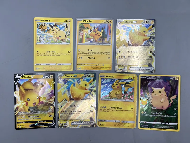 (7) Assorted Pokemon Pikachu Cards W/ EX & Full Arts - Varying Conditions from auction in Greenville, Ohio