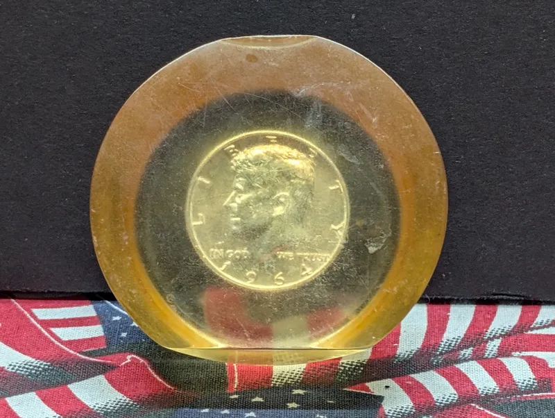 1964 Kennedy 90% Silver Half-Dollar - In Lucite Paper weight from auction in Greenville, Ohio