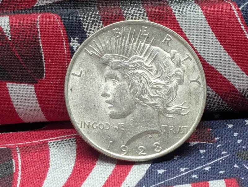 1923-P Peace Dollar, 90% Silver, 26.73 g from auction in Greenville, Ohio