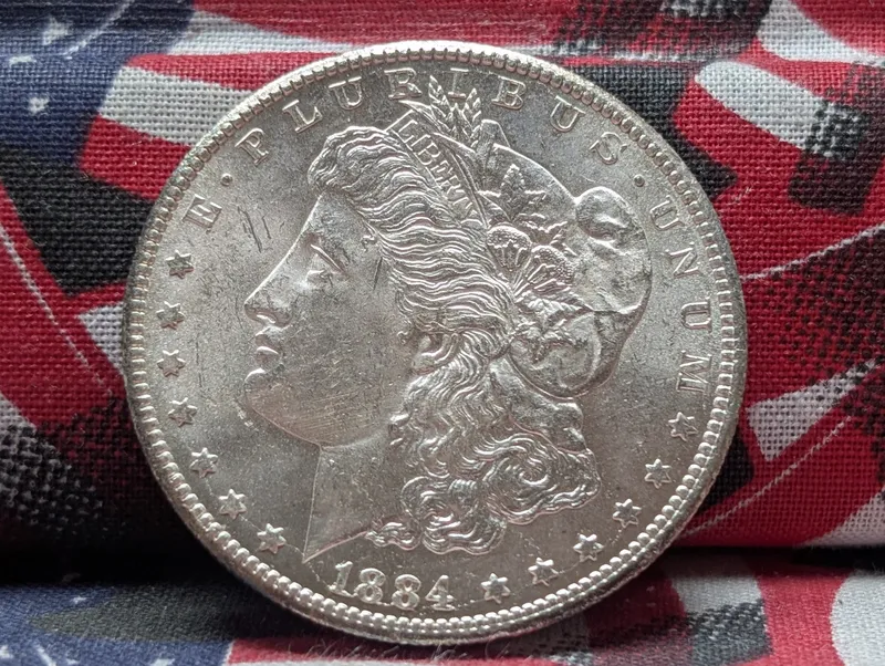 1884-CC Morgan 90% Silver Dollar - Crisp BU Condition from auction in Greenville, Ohio
