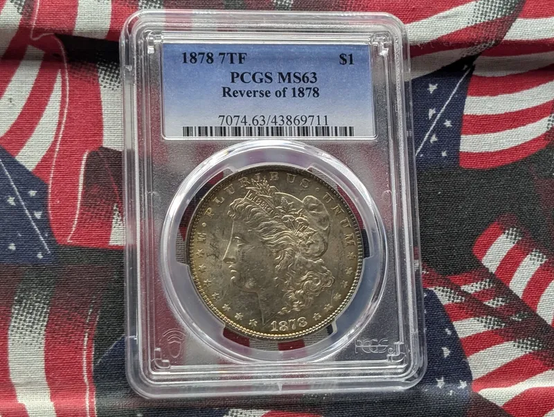 1878 7TF Morgan 90% Silver Dollar W/ Reverse of 1878 PCGS MS63 from auction in Greenville, Ohio