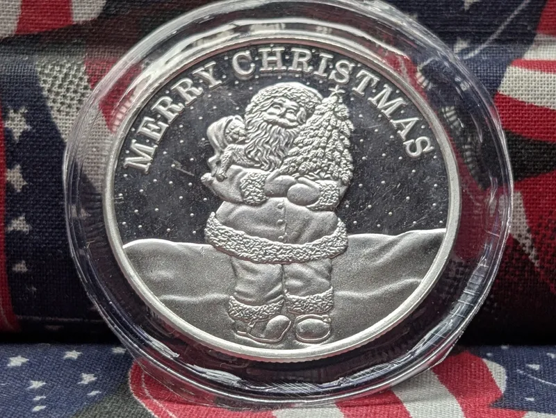 1 Troy Oz. .999 FINE SILVER Merry Christmas Santa Designed Round in Sealed Plastic from auction in Greenville, Ohio