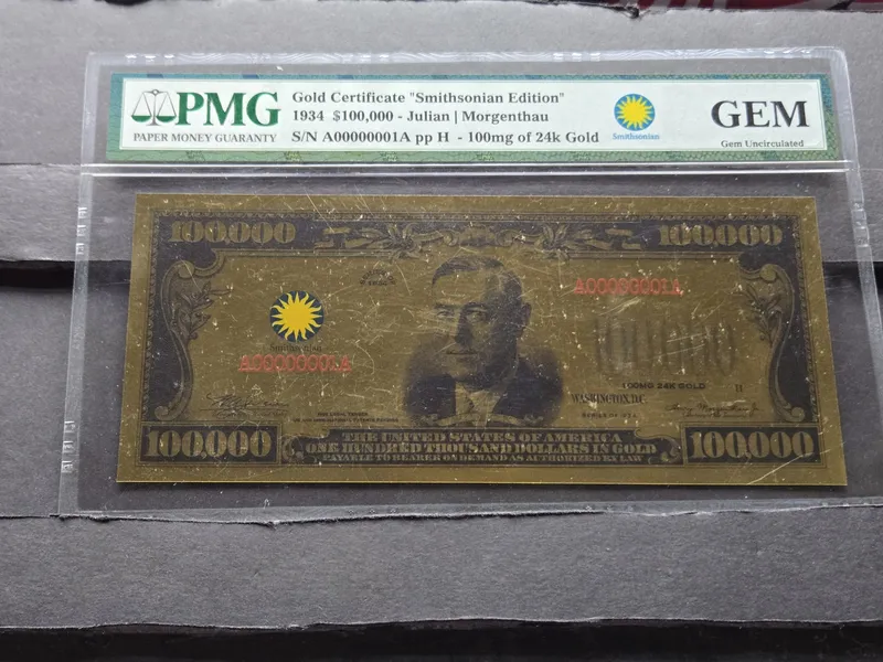 1934 Gold Certificate Smithsonian Edition 100mg of 24k Gold PMG Gem Uncirculated from auction in Greenville, Ohio