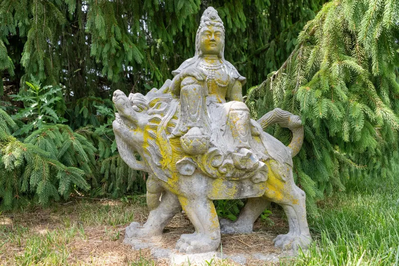 Antique Garden Sculpture Kwan Yin Riding a Lion from auction in York, Pennsylvania