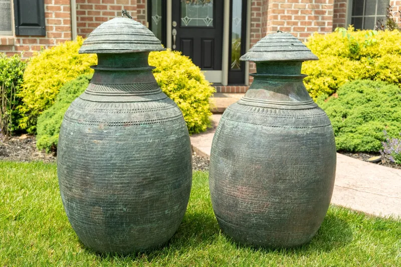 Monumental Nepalese Metal Water Jars, Pair from auction in York, Pennsylvania