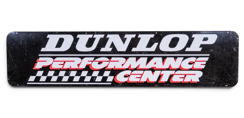 Dunlop Performance Two-Sided Metal Sign from auction in York, Pennsylvania
