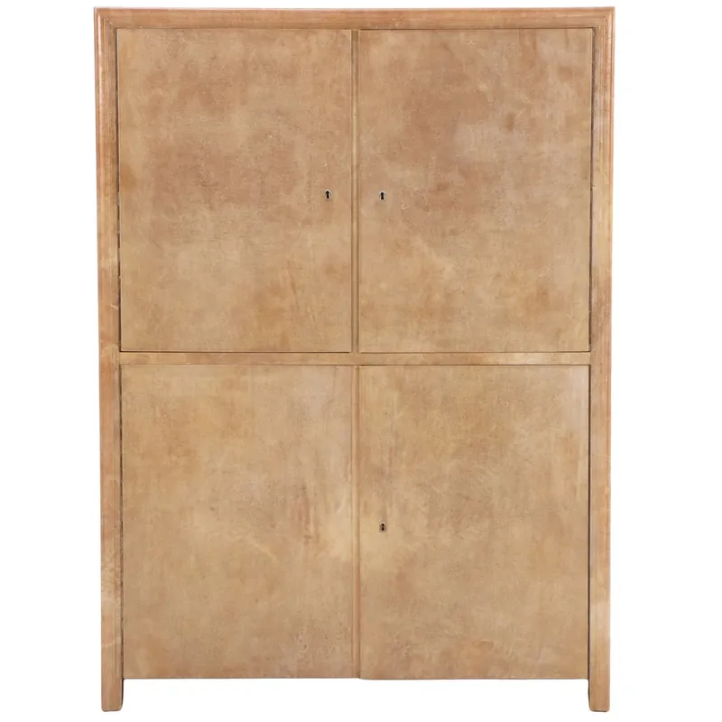 FOUR DOOR PARCHMENT COVERED CABINET HAVING INTERIOR DRAWERS AND SHELVES C 1955. from auction in Philadelphia, Pennsylvania