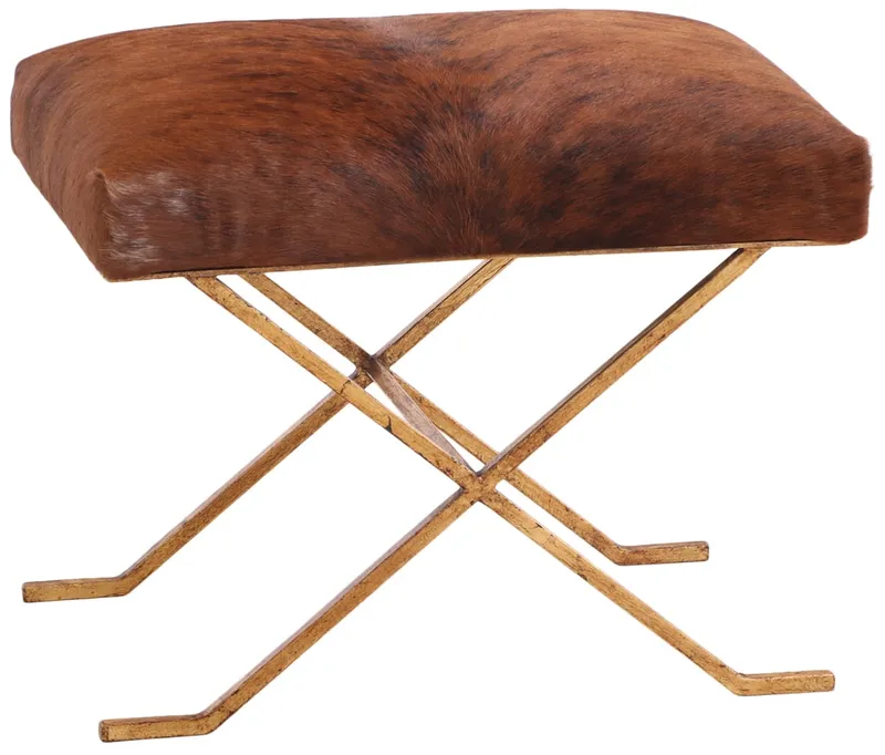 GILT IRON AND COW HIDE STOOL IN THE MANNER OF JEAN-MICHEL FRANK. from auction in Philadelphia, Pennsylvania