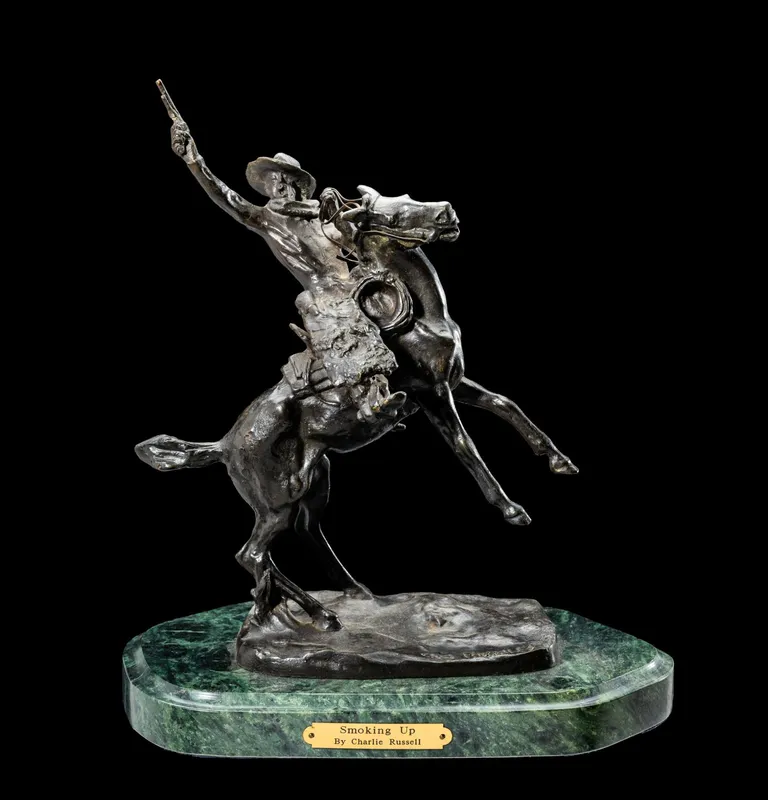 After Charles Marion Russell "Smoking Up" Bronze Sculpture from auction in Harrisburg, Pennsylvania