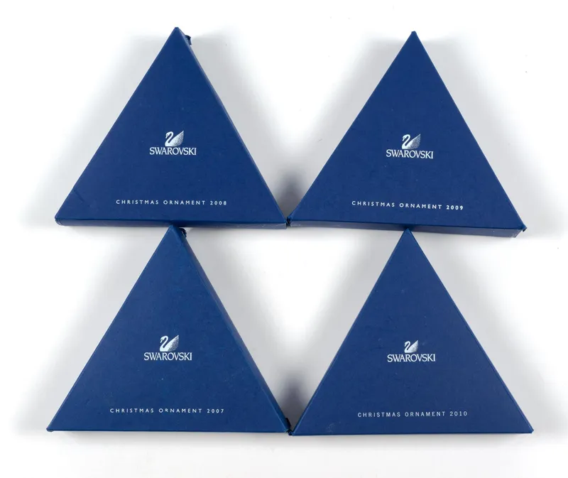 4 Swarovski Crystal Christmas Ornaments from auction in Harrisburg, Pennsylvania