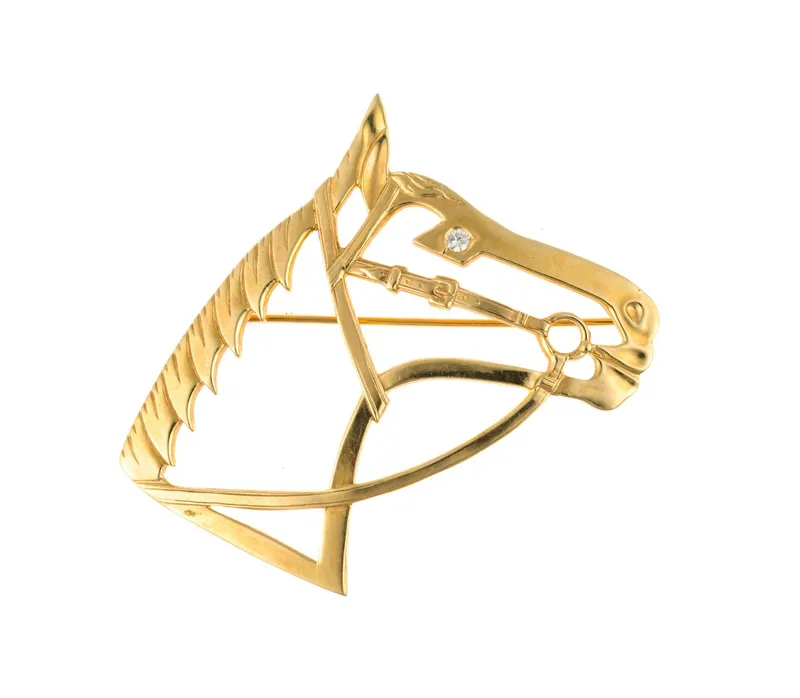 14K Gold Equestrian Horse Brooch from auction in Harrisburg, Pennsylvania