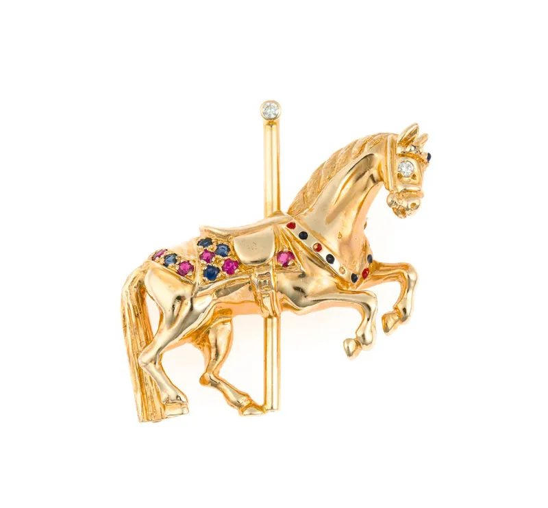 Danker 14K Gold and Gemstone Carousel Horse Brooch from auction in Harrisburg, Pennsylvania