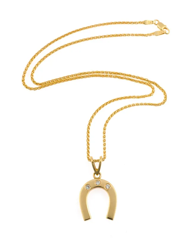 18K Gold Equestrian Horseshoe Pendant Necklace from auction in Harrisburg, Pennsylvania