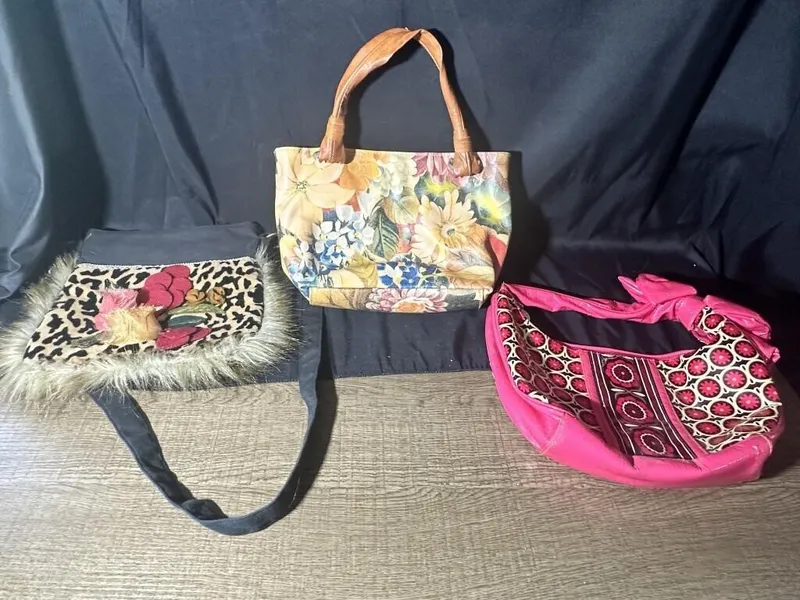 Three Floral Purses from auction in Clifford , Pennsylvania