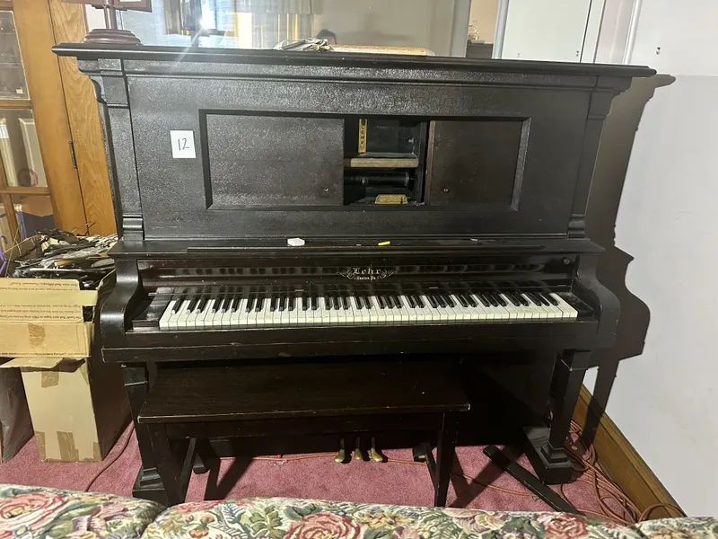 Lehr Upright Player Piano Lehr Easton, PA upright player piano with bench. Includes player mechanism as shown from auction in Clifford , Pennsylvania