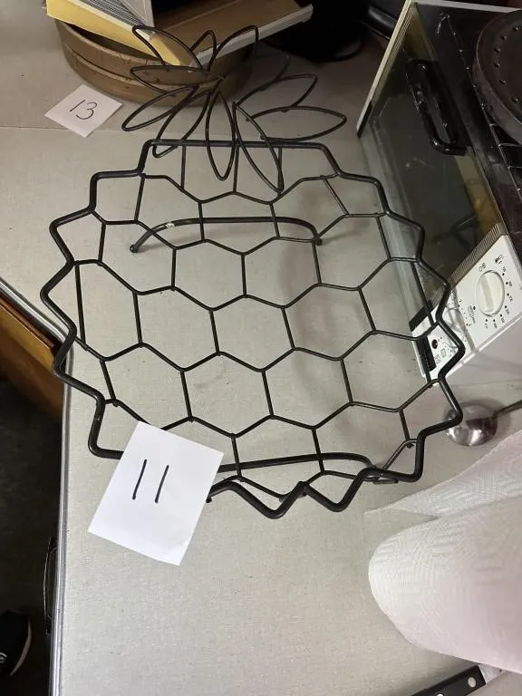 Pineapple Shaped Wire Fruit Basket from auction in Clifford , Pennsylvania
