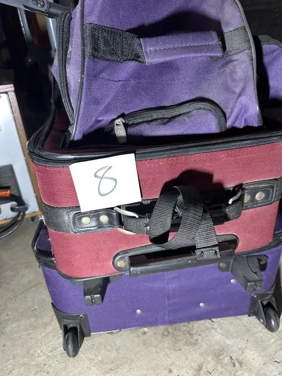 Lot of Suitcases and Duffle Bag from auction in Clifford , Pennsylvania