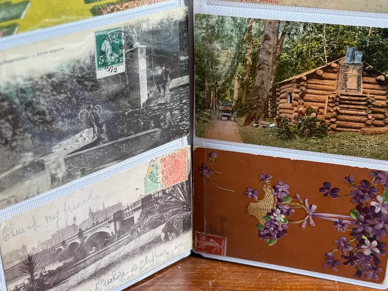 BINDER FULL OF ANTIQUE POST CARDS from auction in Salem, Oregon