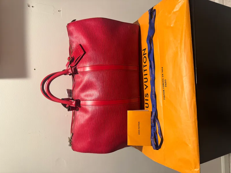 LOUIS VUITTON KEEPALL 50, RED EPI LEATHER (M42967) from auction in Atlanta, Georgia
