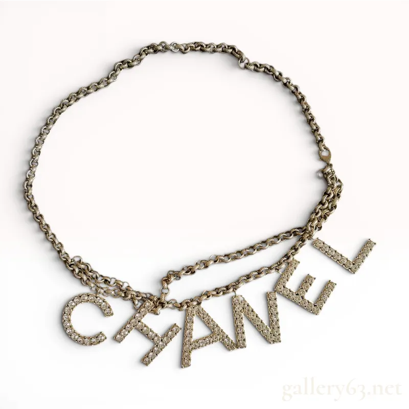 Chanel C19 K Gold-Tone and Crystal Letter Charm Belt or Necklace from auction in Atlanta, Georgia
