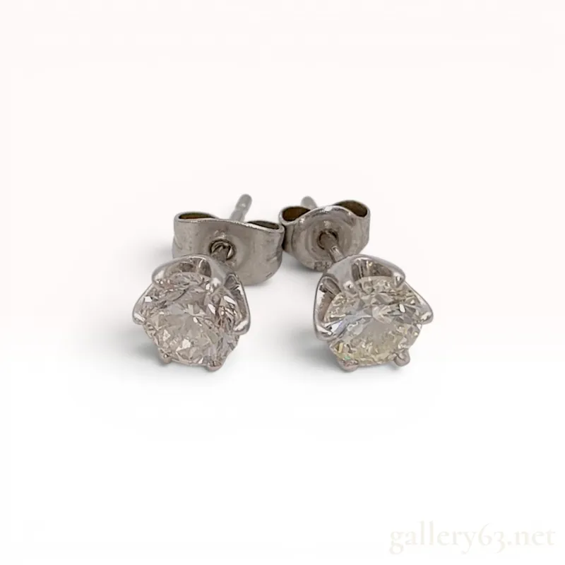 A Pair of 1.5ctw Platinum and Round Brilliant Cut Colorless Natural Diamond Stud Earrings from auction in Atlanta, Georgia