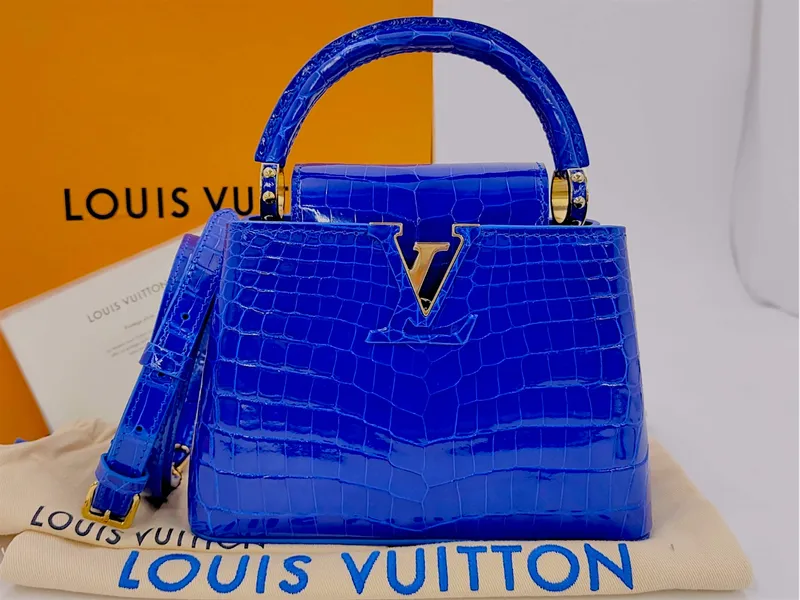 Louis Vuitton Capucines Mini Handbag in Electric Blue Shiny Crocodilian Leather with Box from auction in Atlanta, Georgia